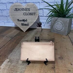 Levenger rose gold pouch